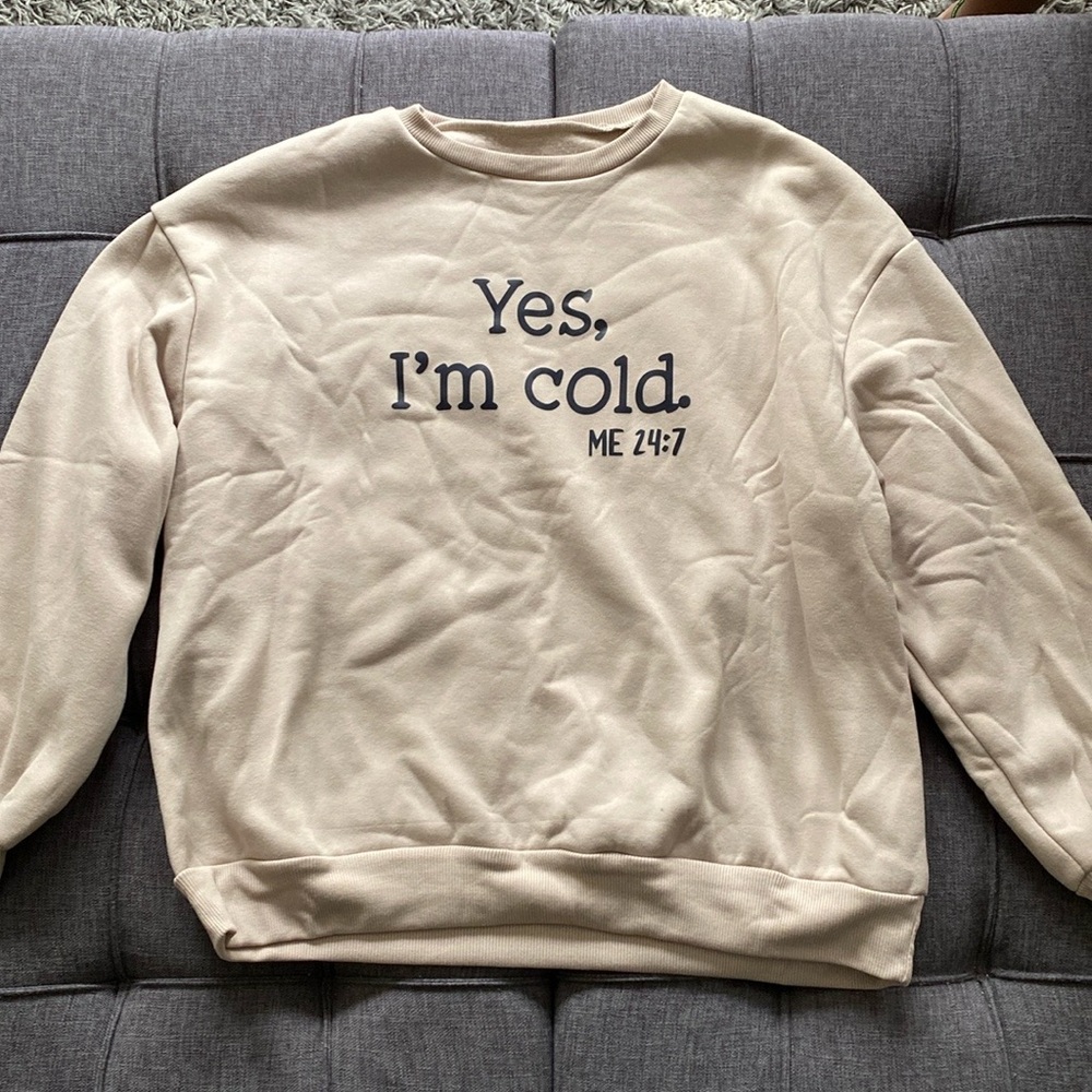Tan sweater.